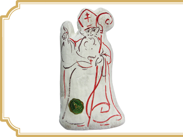 Nos saints Nicolas en pain d’épices au miel, recouverts de glace royale et peints à la main.